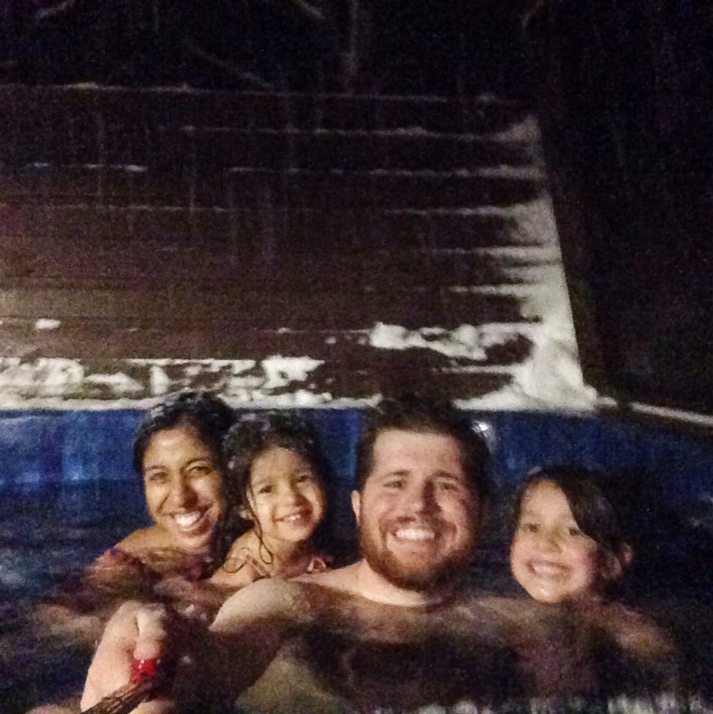 family in hot tub in iceland
