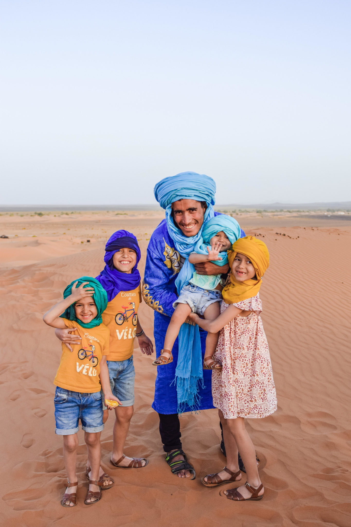 berber guide with kids sahara morocco