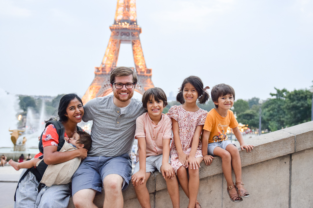  Best Things to Do In Paris With Kids featured by top US family travel blog, Local Passport Family: image of a family visit to paris eiffel tower from trocadero