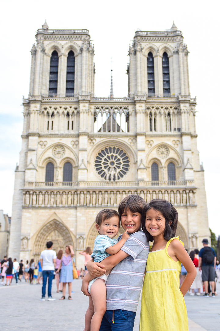  Best Things to Do In Paris With Kids featured by top US family travel blog, Local Passport Family: image of notre-dame cathedral paris with kids