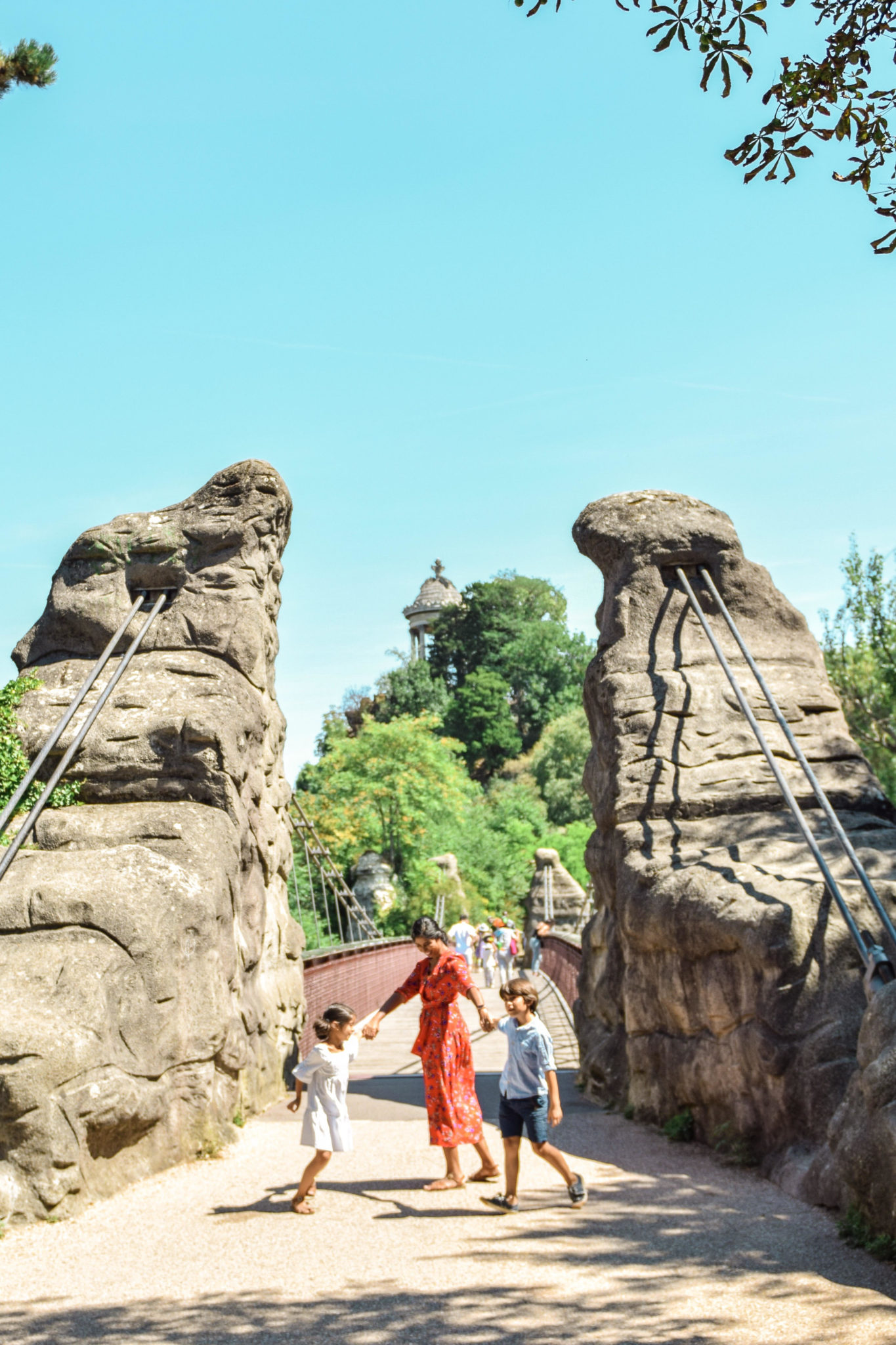  Best Things to Do In Paris With Kids featured by top US family travel blog, Local Passport Family: image of parc des buttes-chaumont with kids paris
