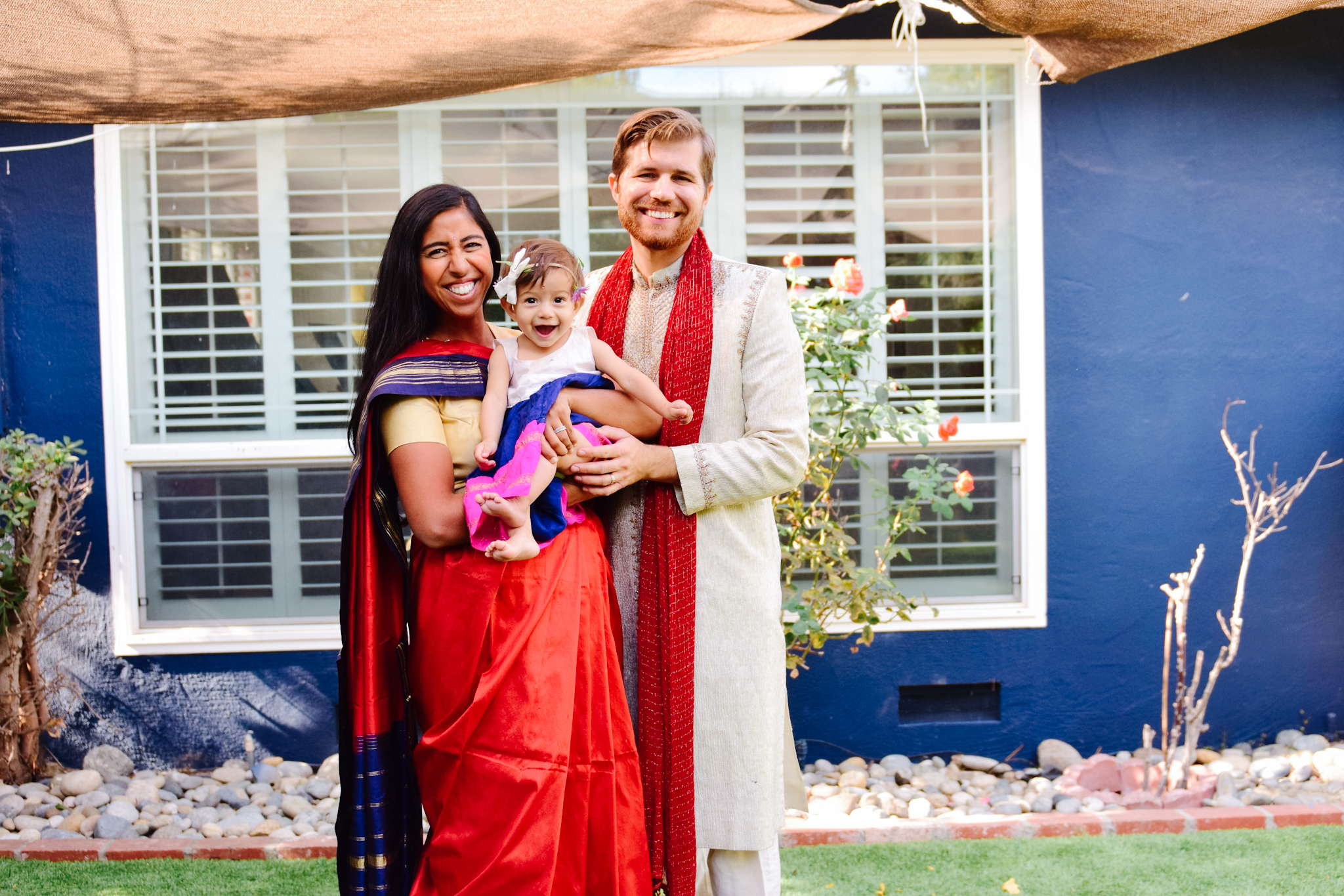 indian and white parents with baby